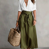 Vera – Two-piece set: black top and olive green midi skirt